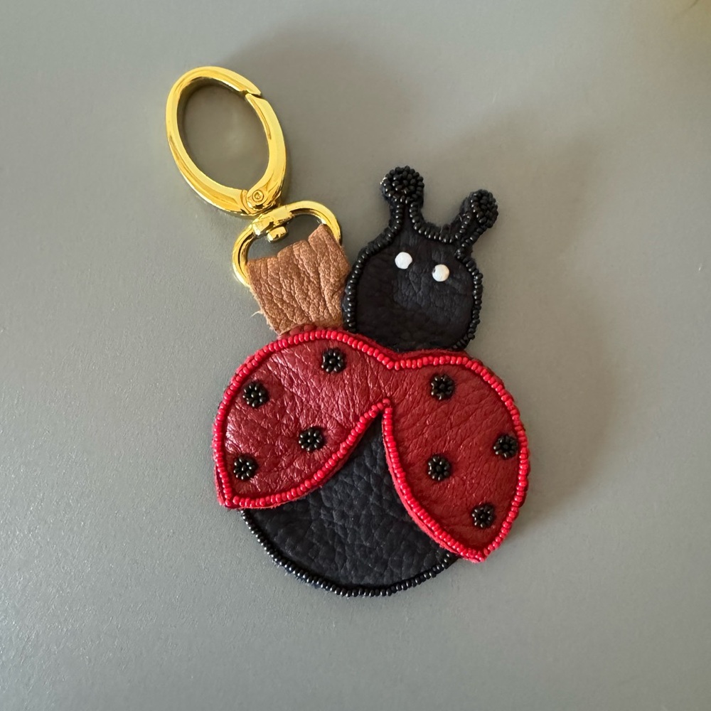 LEATHER AND BEADED LADY BUG PURSE CHARM
